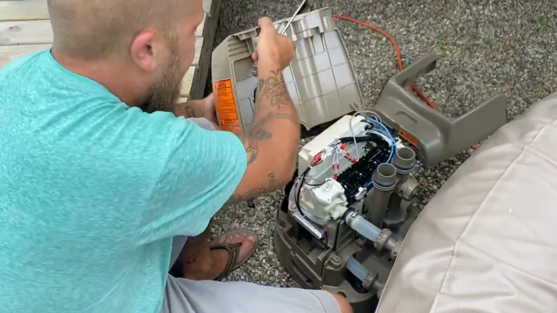 Intex PureSpa opened for an E95 temperature-sensor repair using ThermoMart M10 probes