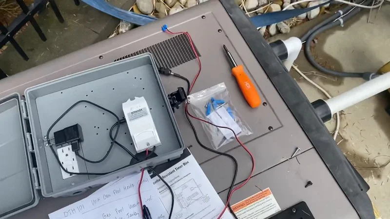 ThermoMart DTH101 controller positioned inside a weatherproof enclosure during installation